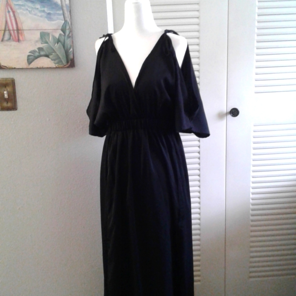 Beautiful Black Full Length With Open Back and Plunging To The Waist  Neckline.